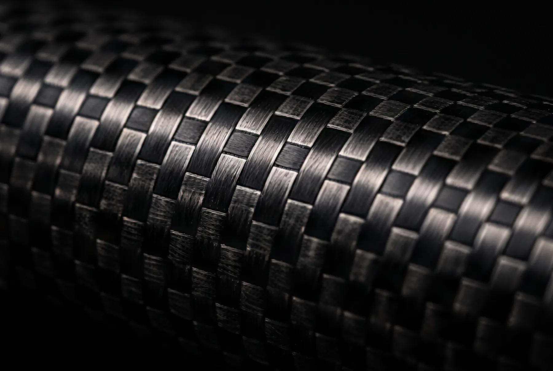 Close-up of the woven carbon wall of a telescopic rod section