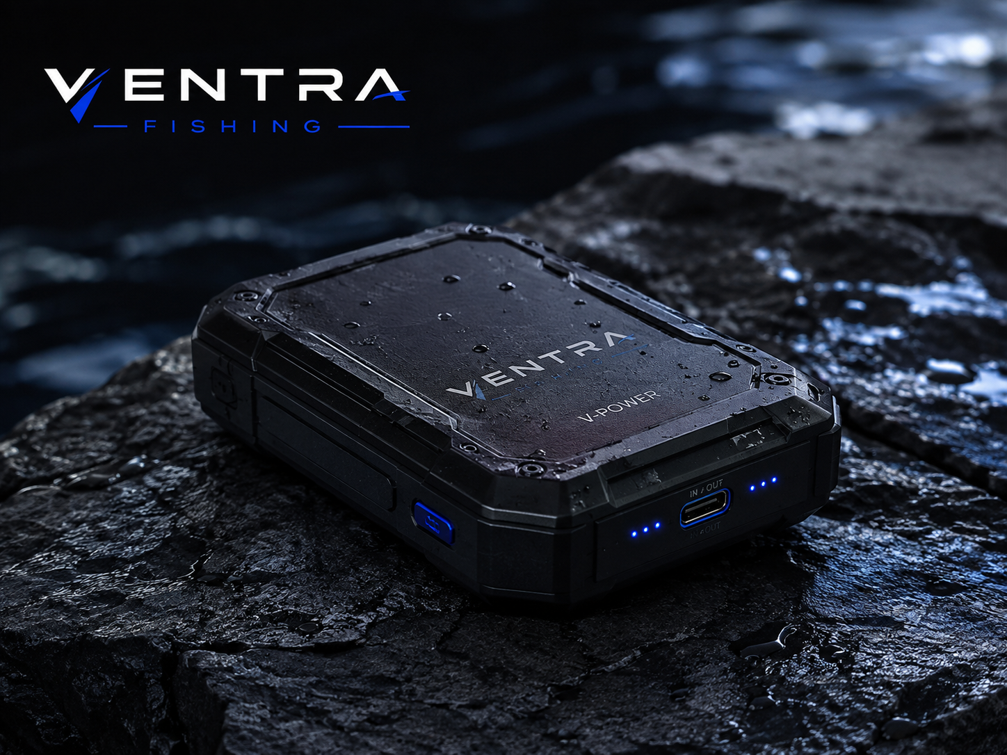 V-POWER compact removable power module on wet dark rock, USB-C ports and battery indicators lit